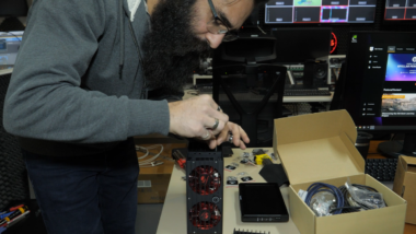 SAT-7 staff repairing equipment.
