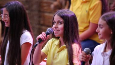 Three children singing