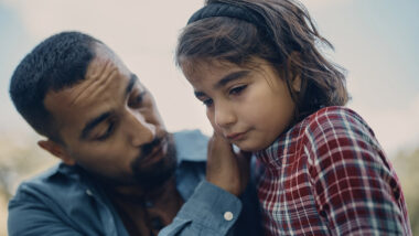 Man comforting girl