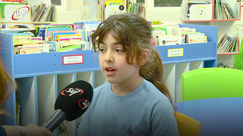 Girl being interviewed
