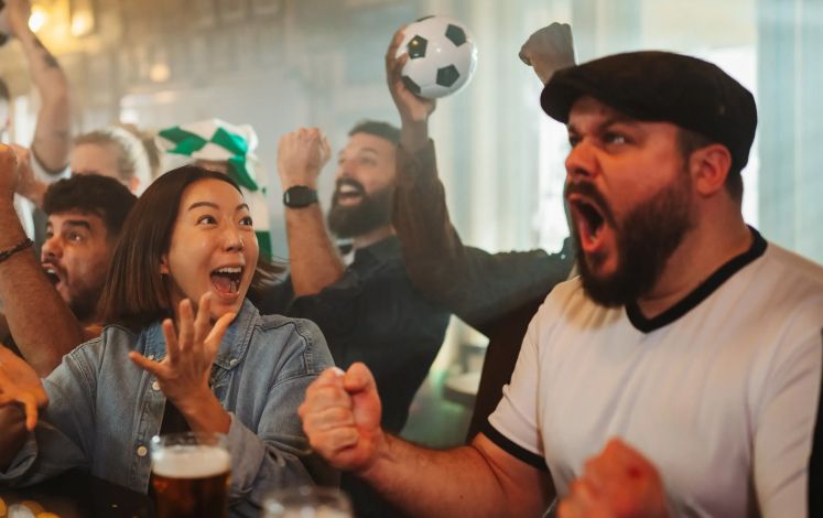 Football fans cheering