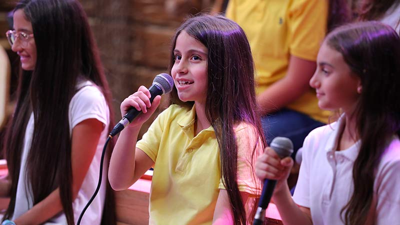Three children singing
